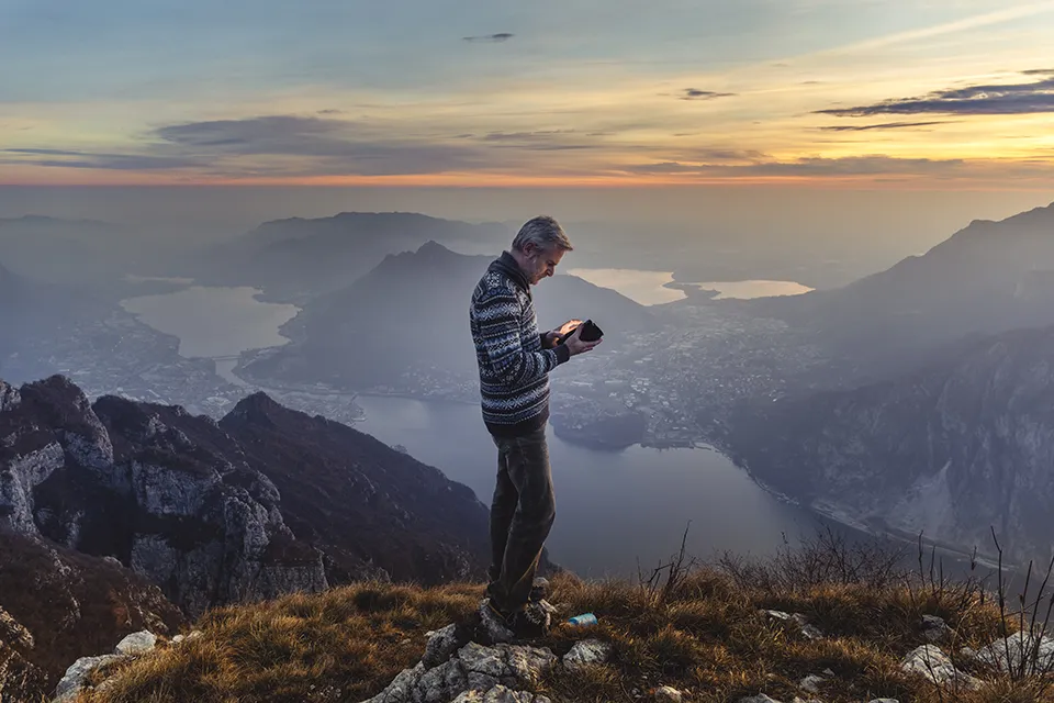 Person using a phone outdoors